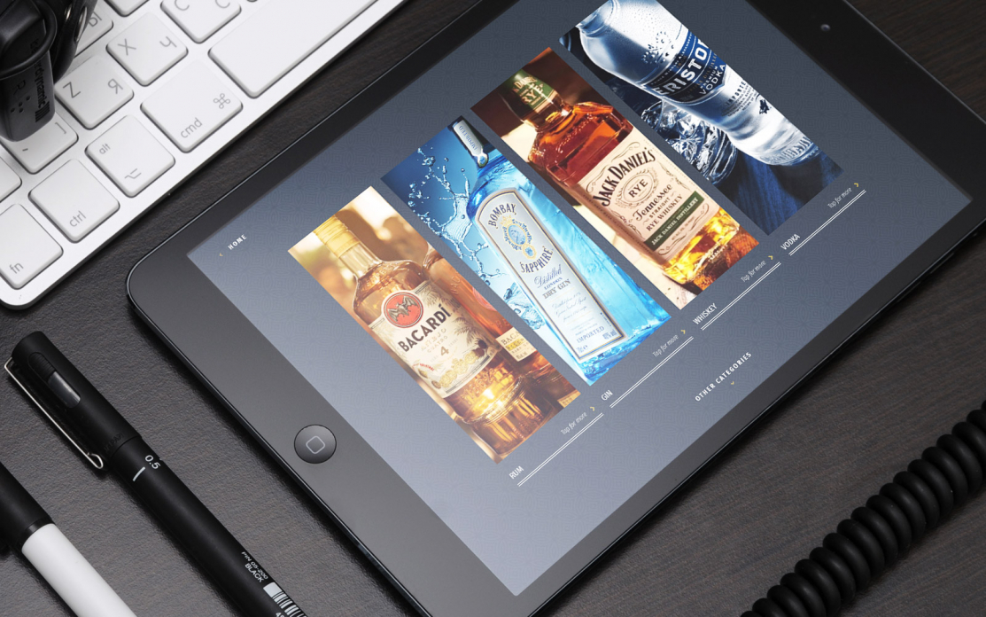 Black iPad displaying Bacardi Limited interactive touchscreen sales enablement tool showing Bombay Sapphire Jack Daniels Eristoff Vodka