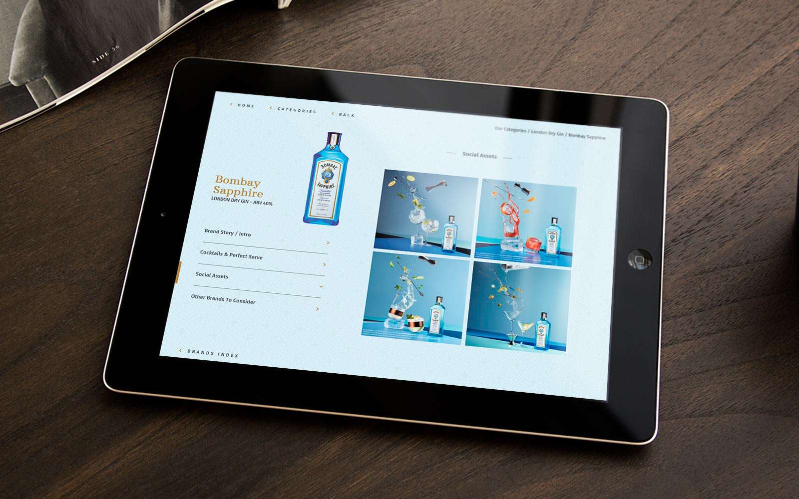 black iPad displaying Bombay Sapphire on Bacardi Limited touchscreen interactive sales enablement tool