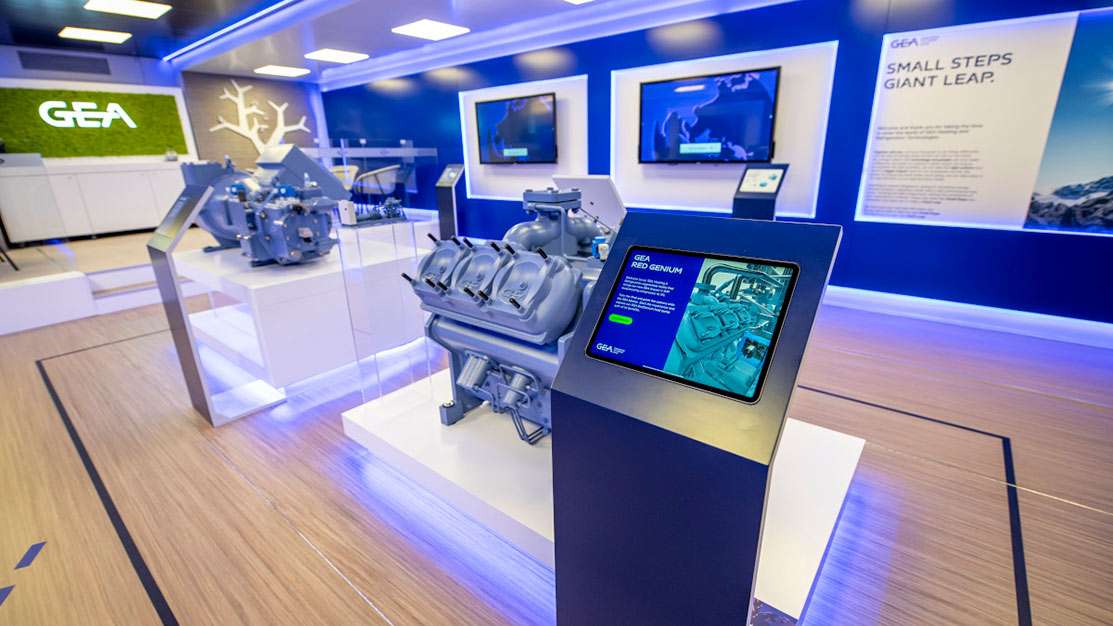 a selection of interactive touchscreens in a demo centre for GEA showing interactive sales presentations, machines onshow