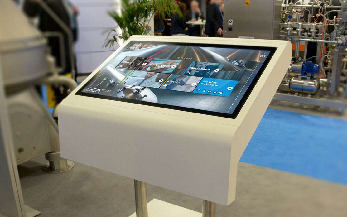 large touchscreen at event with GEA interactive touchscreen experience displaying