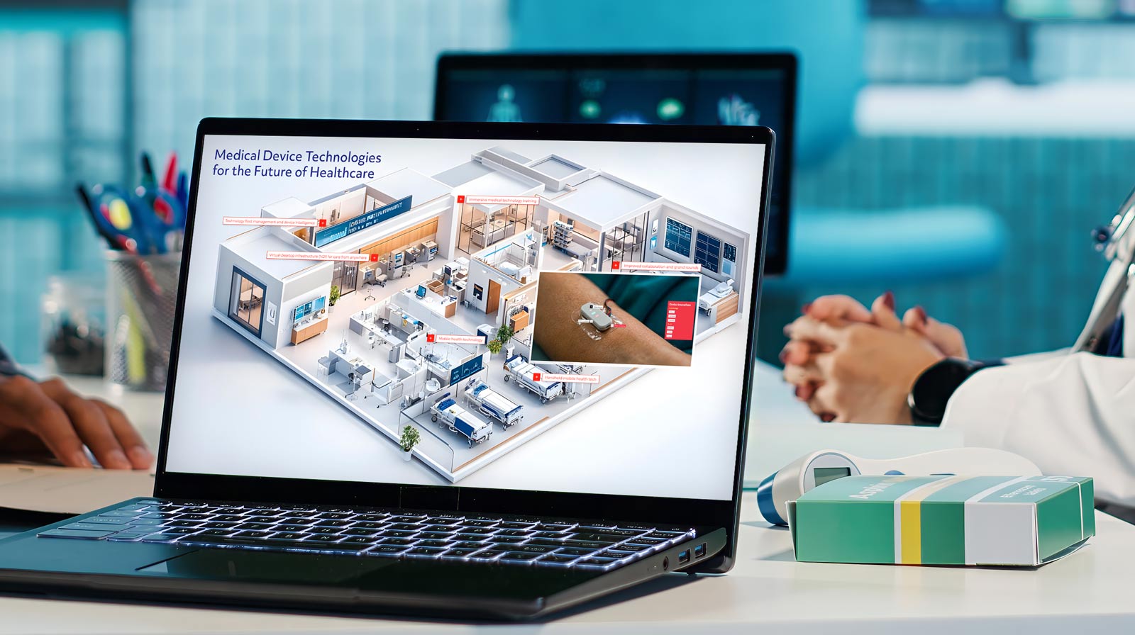 laptop with visual of a modern hospital with text and popup cards highlighting new product features, laptop on a table with a doctor and nurse looking at the information on the laptop